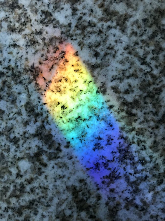 De regenboog legt op een marmer royalty-vrije stock foto De regenboog legt op een marmer royalty-vrije stock foto