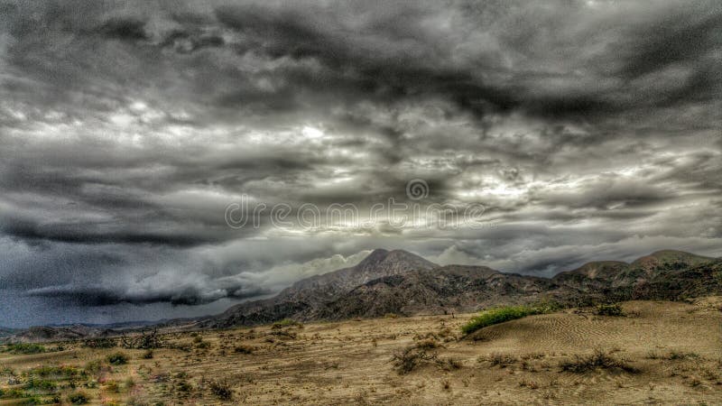 Storm clouds cross the Mojave desert, California. Storm clouds cross the Mojave desert, California.