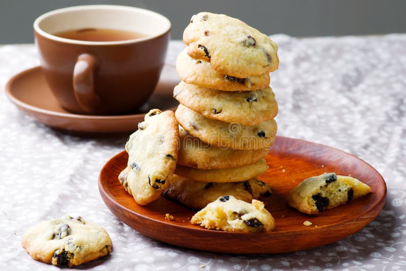 Cornmeal chocolate chunk cookies raisins..rustic style.selective focus. Cornmeal chocolate chunk cookies raisins..rustic style.selective focus