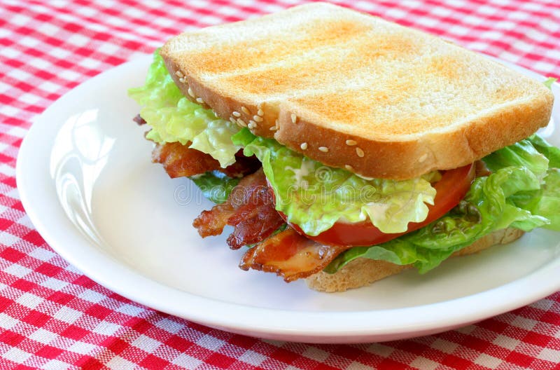 De Sandwich van het bacon, van de Sla en van de Tomaat royalty-vrije stock fotografie De Sandwich van het bacon, van de Sla en van de Tomaat royalty-vrije stock fotografie
