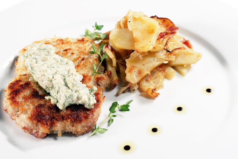 De Schnitzel van het varkensvlees royalty-vrije stock fotografie De Schnitzel van het varkensvlees royalty-vrije stock fotografie