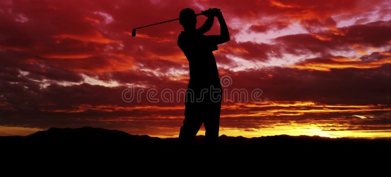 A silhouette of a golfer swinging at sunset. A silhouette of a golfer swinging at sunset