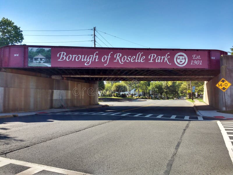 This bridge crosses over Chestnut Street in Roselle Park, New Jersey. New Jersey Transit commuter trains use this trestle to access the borough's railroad station. This bridge crosses over Chestnut Street in Roselle Park, New Jersey. New Jersey Transit commuter trains use this trestle to access the borough's railroad station.