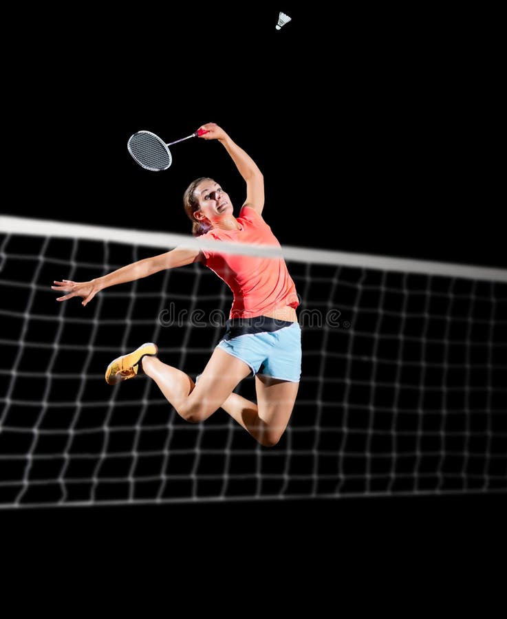 De spelerversie van het vrouwenbadminton met netto en shuttle royalty-vrije stock fotografie De spelerversie van het vrouwenbadminton met netto en shuttle royalty-vrije stock fotografie