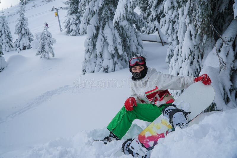 De de sportenwinter van de vrouwen snowboard sneeuw royalty-vrije stock foto De de sportenwinter van de vrouwen snowboard sneeuw royalty-vrije stock foto