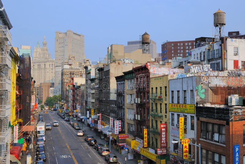 Shops and apartments down East Broadway in Chinatown, New York City. Shops and apartments down East Broadway in Chinatown, New York City.