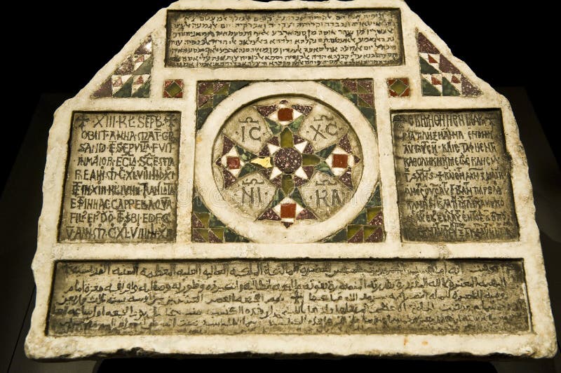 The Commemoration Stone in Four Languages, commemorating the death of the mother of the priest Grisanto in 1148. The stone mirrors the period of multiple cultures co-existing within the Norman kingdom of Sicily. The Commemoration Stone in Four Languages, commemorating the death of the mother of the priest Grisanto in 1148. The stone mirrors the period of multiple cultures co-existing within the Norman kingdom of Sicily.