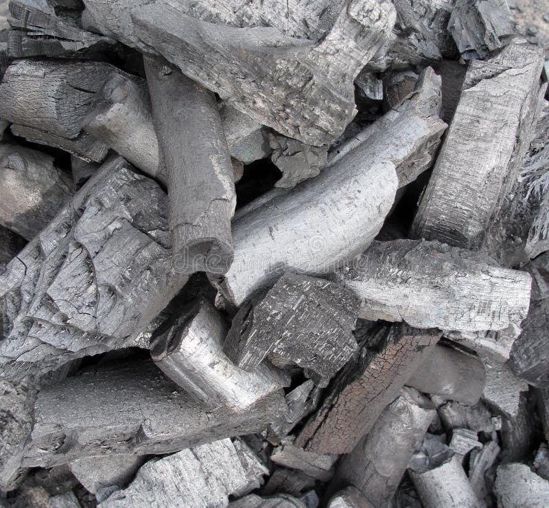 Charcoal is the blackish residue consisting of impure carbon obtained by removing water and other volatile constituents from animal and vegetation substances. Charcoal is usually produced by slow pyrolysis, the heating of wood, sugar, bone char, or other substances in the absence of oxygen (see pyrolysis, char and biochar). The resulting soft, brittle, lightweight, black, porous material resembles coal and is 85% to 98% carbon with the remainder consisting of volatile chemicals and ash. The first part of the word is of obscure origin, but the first use of the term coal in English was as a reference to charcoal. In this compound term, the prefix chare- meant turn, with the literal meaning being to turn to coal. The independent use of char, meaning to scorch, to reduce to carbon, is comparatively recent and is assumed to be a back-formation from the earlier charcoal. It may be a use of the word charren or churn, meaning to turn; i.e. wood changed or turned to coal, or it may be from the French charbon. A person who manufactured charcoal was formerly known as a collier (also as a wood collier). The word collier was also used for those who mined or dealt in coal, and for the ships that transported it. Charcoal, or biochar, is also an essential element in the composition of terra preta. Charcoal is the blackish residue consisting of impure carbon obtained by removing water and other volatile constituents from animal and vegetation substances. Charcoal is usually produced by slow pyrolysis, the heating of wood, sugar, bone char, or other substances in the absence of oxygen (see pyrolysis, char and biochar). The resulting soft, brittle, lightweight, black, porous material resembles coal and is 85% to 98% carbon with the remainder consisting of volatile chemicals and ash. The first part of the word is of obscure origin, but the first use of the term coal in English was as a reference to charcoal. In this compound term, the prefix chare- meant turn, with the literal meaning being to turn to coal. The independent use of char, meaning to scorch, to reduce to carbon, is comparatively recent and is assumed to be a back-formation from the earlier charcoal. It may be a use of the word charren or churn, meaning to turn; i.e. wood changed or turned to coal, or it may be from the French charbon. A person who manufactured charcoal was formerly known as a collier (also as a wood collier). The word collier was also used for those who mined or dealt in coal, and for the ships that transported it. Charcoal, or biochar, is also an essential element in the composition of terra preta.