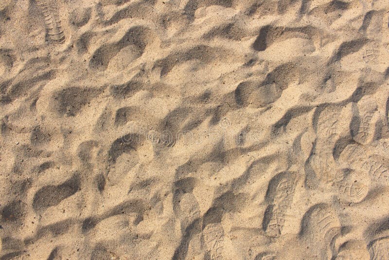 De textuur van het zand Bruin zand Achtergrond van fijn zand royalty-vrije stock foto De textuur van het zand Bruin zand Achtergrond van fijn zand royalty-vrije stock foto
