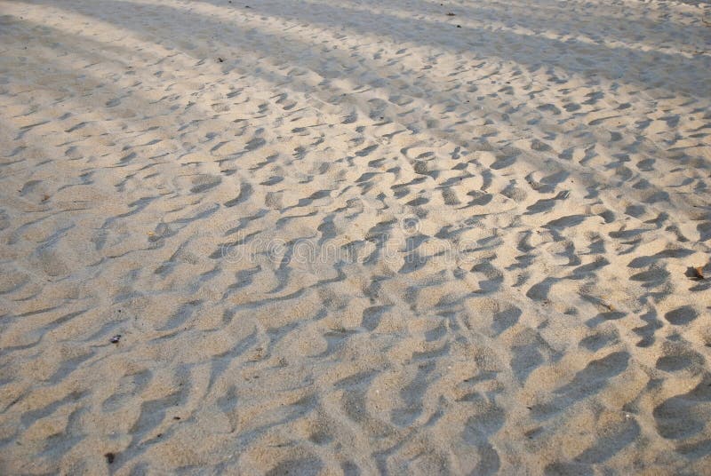 De Textuur van het Zand van het strand royalty-vrije stock foto De Textuur van het Zand van het strand royalty-vrije stock foto
