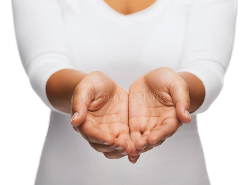 People and advertisement concept - close up of womans cupped hands showing something. People and advertisement concept - close up of womans cupped hands showing something