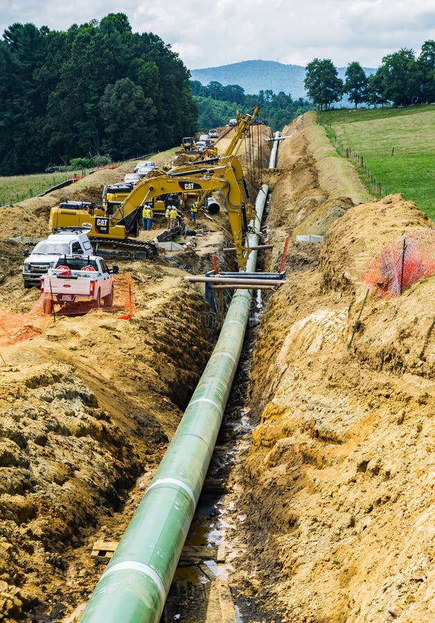 Roanoke County, Virginia USA – July 29th: Mountain Valley Pipeline MVP cutting under the Blue Ridge Parkway at Bent Mountain, Virginia, USA on July 29th, 2018. Roanoke County, Virginia USA – July 29th: Mountain Valley Pipeline MVP cutting under the Blue Ridge Parkway at Bent Mountain, Virginia, USA on July 29th, 2018.