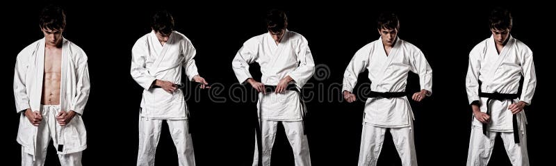 De vechter van de karate mannelijk het kleden zich kimono hoog contrast