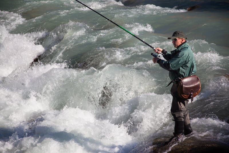 Fly fishing on mountain river. Fly fishing on mountain river