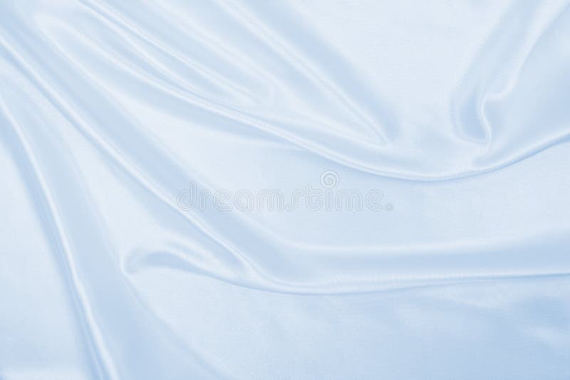 De vlotte elegante blauwe zijde of satijntextuur van de luxedoek als abstra royalty-vrije stock foto De vlotte elegante blauwe zijde of satijntextuur van de luxedoek als abstra royalty-vrije stock foto