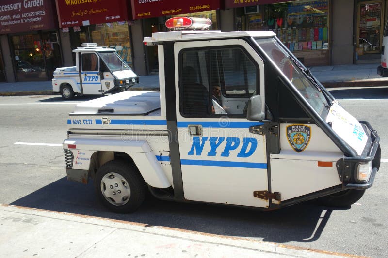 Two Go-4 vehicles belonging to the New York Police Department, in Midtown Manhattan. Two Go-4 vehicles belonging to the New York Police Department, in Midtown Manhattan.