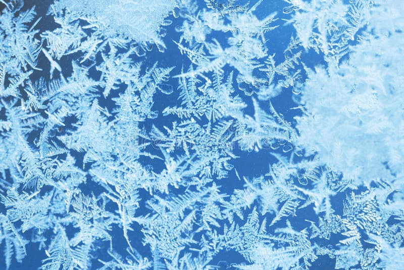 De vorst van het de winterijs, bevroren achtergrond berijpt vensterglas textur
