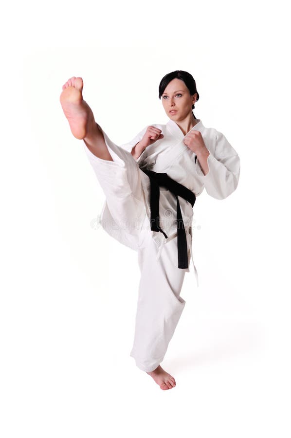 De vrouw van de karate het stellen stock fotografie De vrouw van de karate het stellen stock fotografie