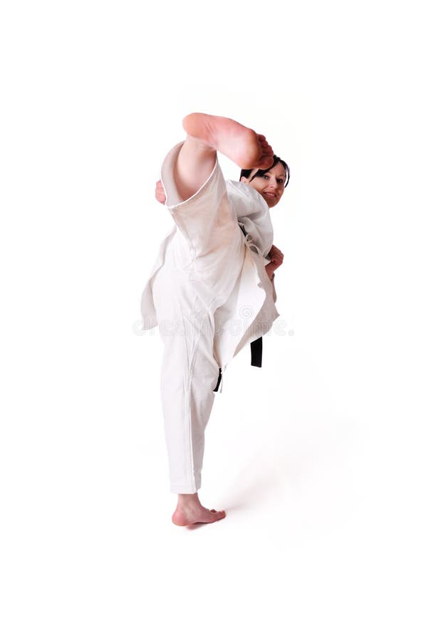 De vrouw van de karate het stellen stock foto De vrouw van de karate het stellen stock foto