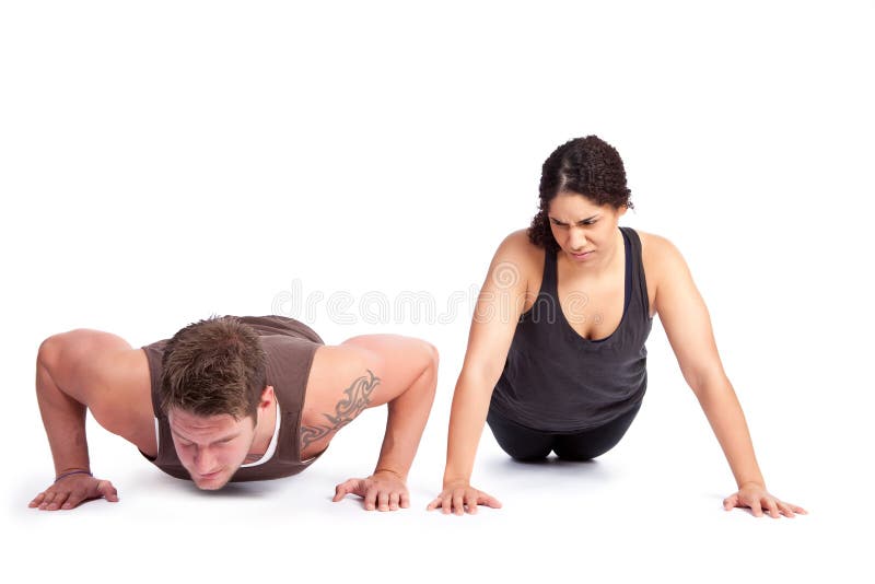 De vrouw van de oefening met trainer stock foto De vrouw van de oefening met trainer stock foto