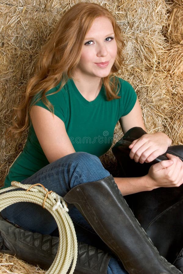 Country woman with rope and saddle. Country woman with rope and saddle