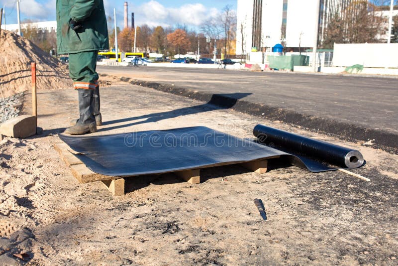 De waterdicht makende wegwerken royalty-vrije stock afbeeldingen De waterdicht makende wegwerken royalty-vrije stock afbeeldingen