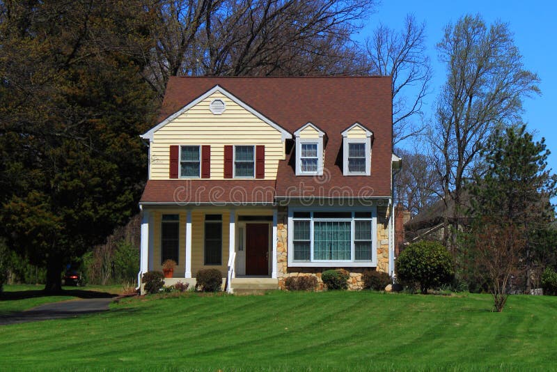 Small rural house in Spring with beautiful green lawn. Small rural house in Spring with beautiful green lawn.