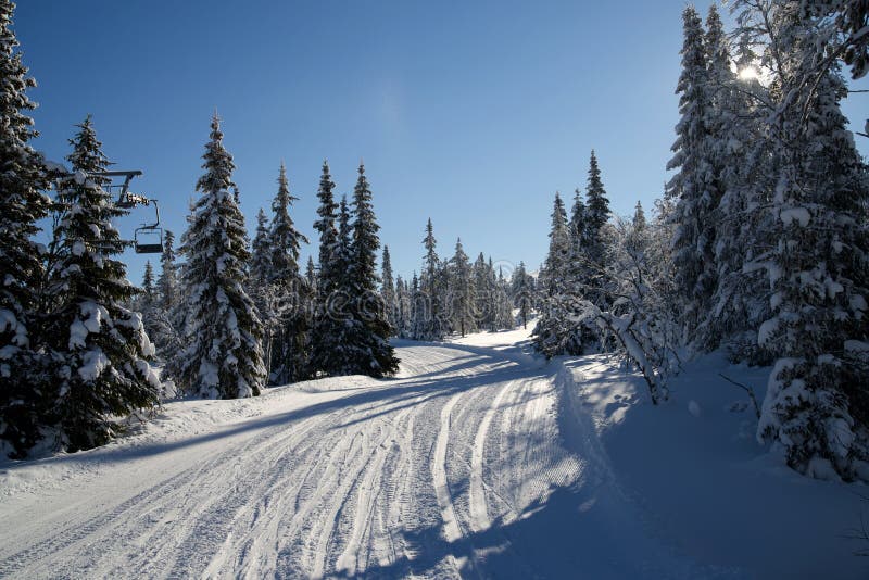 Winter, snow covered ski road. Winter, snow covered ski road.