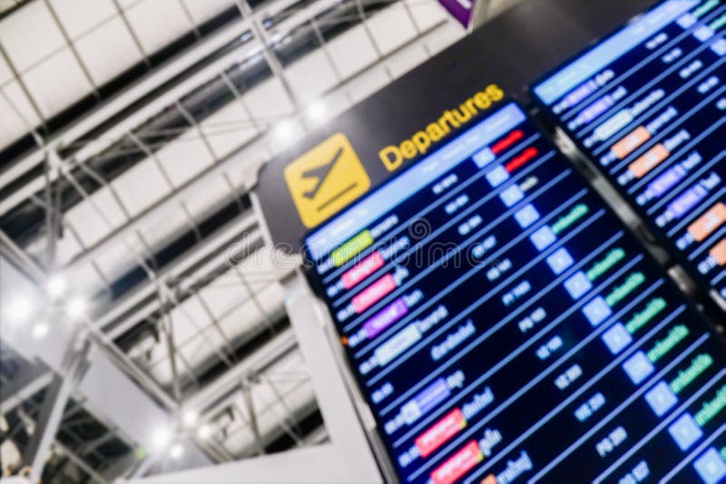 De zachte nadruk van van de Luchthavenvertrek en Aankomst informatieraad ondertekent, de informatieprogramma van vertrekvluchten stock afbeelding De zachte nadruk van van de Luchthavenvertrek en Aankomst informatieraad ondertekent, de informatieprogramma van vertrekvluchten stock afbeelding