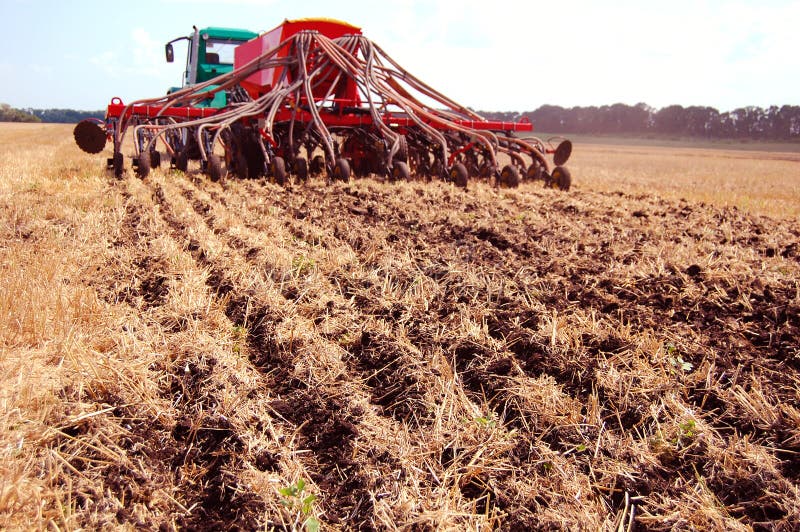 De zaden van de boor door No-till stock foto De zaden van de boor door No-till stock foto