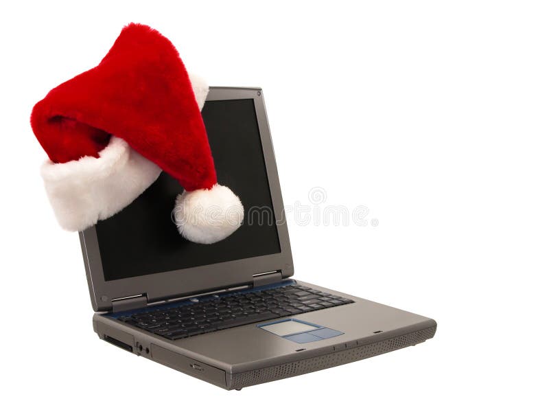 De Zitting van de Hoed van de kerstman op Laptop (2 van 3) stock foto's De Zitting van de Hoed van de kerstman op Laptop (2 van 3) stock foto's