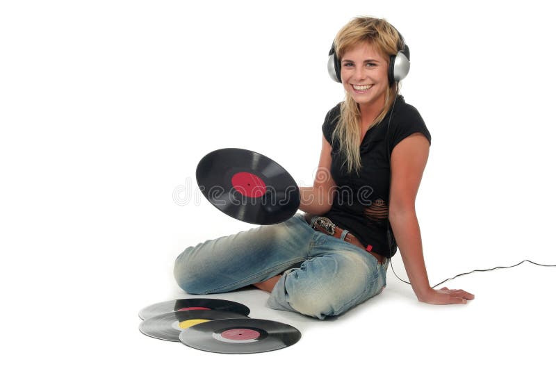 Young woman sitting with vinyl records. Young woman sitting with vinyl records