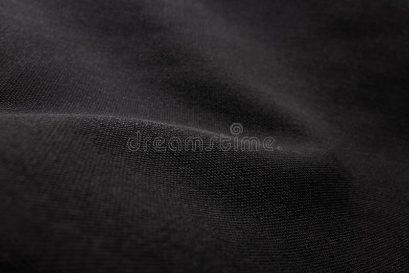 De zwarte achtergrond van de stoffentextuur Detail van canvas textielproduct