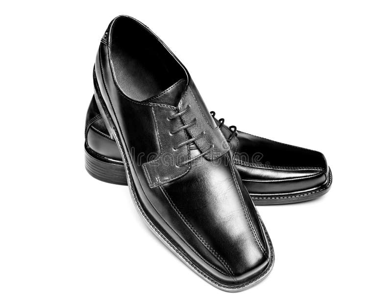 De zwarte schoenen van de leerkleding