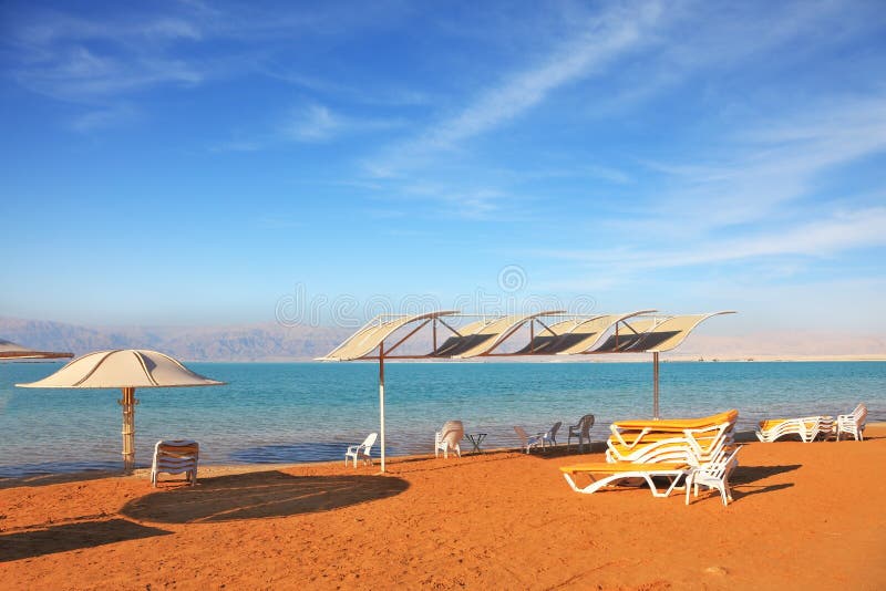 Dead Sea, the Orange Sand and Beach Chairs Stock Image - Image of space ...