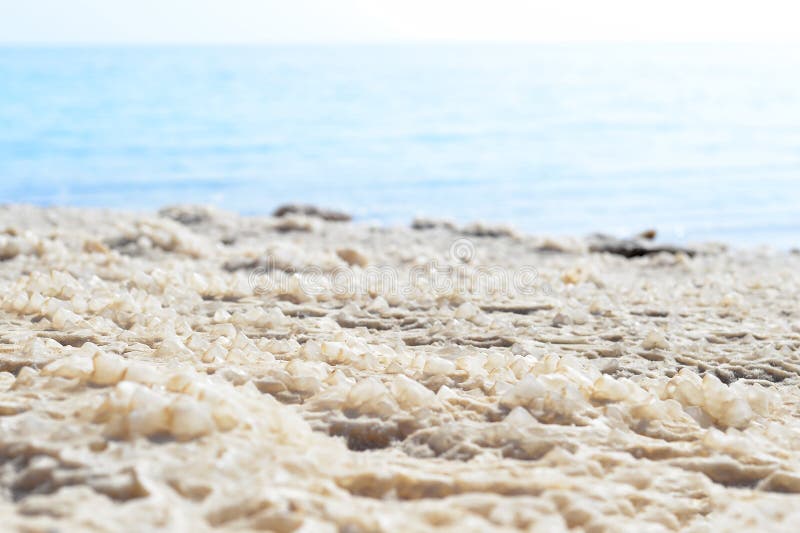Dead Sea Salt Mineral Crystal Formations in Blue Water Stock Photo