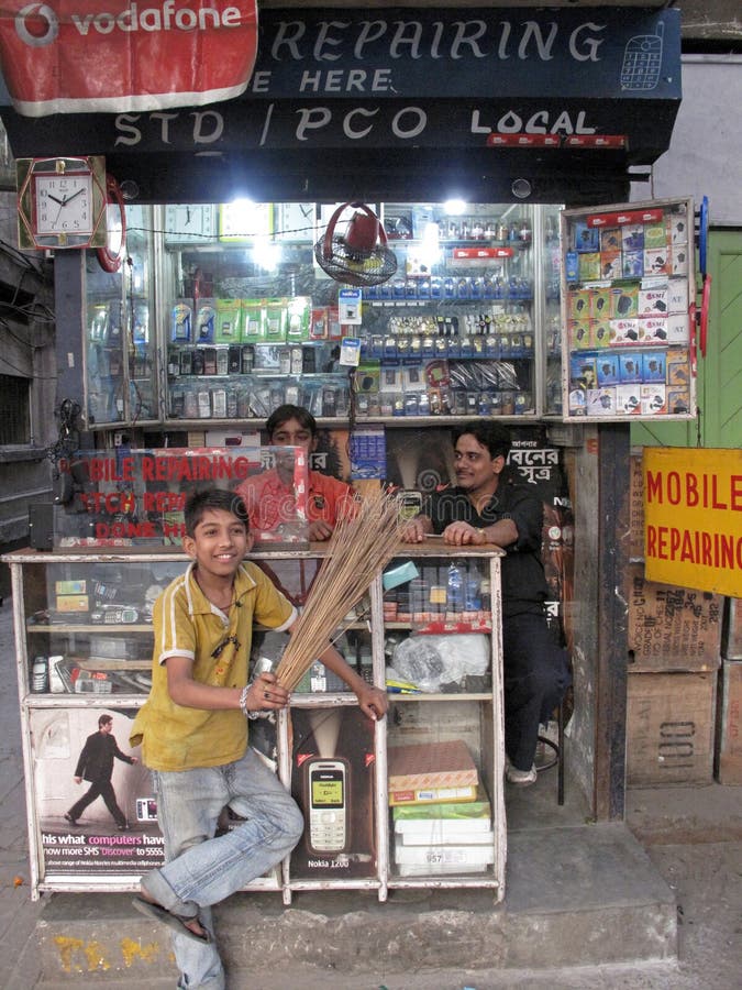 Dealers with mobile phones editorial image. Image of stores 21213650