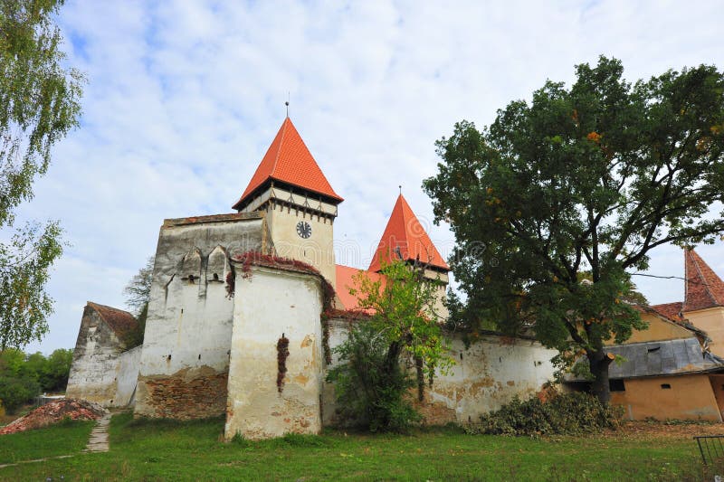 Dealul Frumos fortified church - Sibiu, Romania. The village of Dealul Frumos is known for its fortified church, originally built around 1100 AD. It is part of royalty free stock photography Dealul Frumos fortified church - Sibiu, Romania. The village of Dealul Frumos is known for its fortified church, originally built around 1100 AD. It is part of royalty free stock photography
