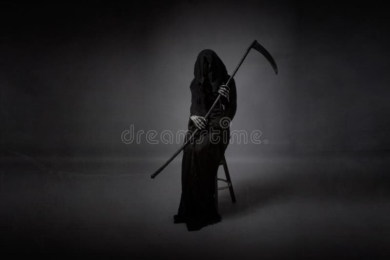 Death sitting with arms on hand. Dark background stock photos