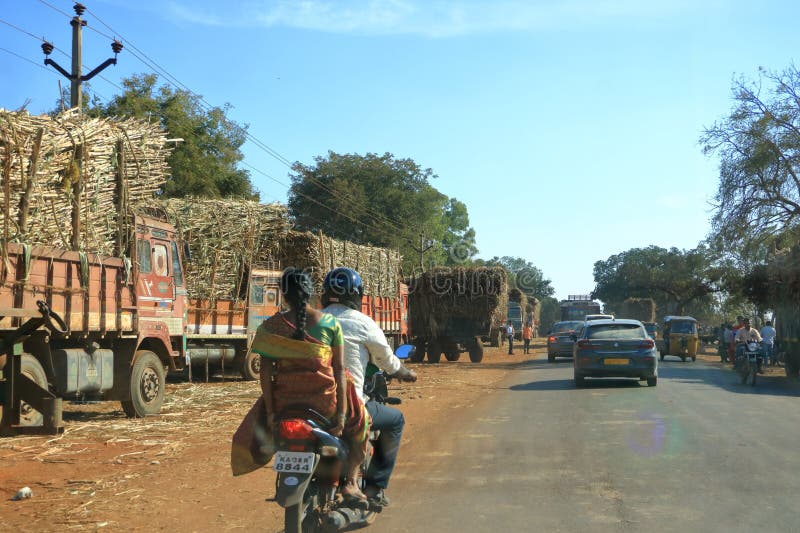 Stock photo of Typical rural transport, overloaded van with people,  Maharashtra, India. Available for sale on