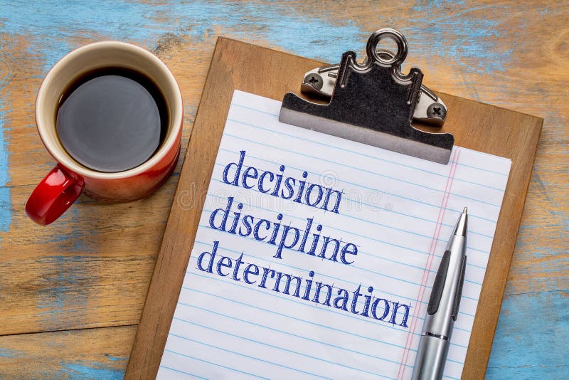 Decision, discipline, and determination. Words on a clipboard with a cup of coffee - motivational tips for achieving goals and success stock photos Decision, discipline, and determination. Words on a clipboard with a cup of coffee - motivational tips for achieving goals and success stock photos
