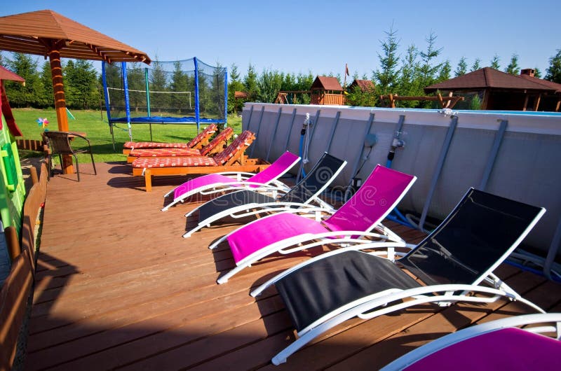 Deck Chairs Ar Backyard Swimming Pool Stock Image Image of pool