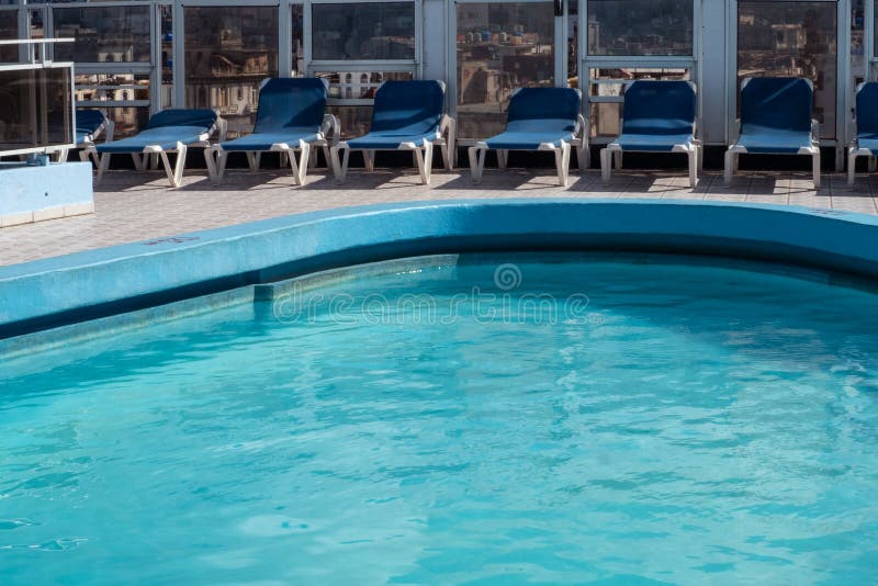 Deck Chairs by Blue Pool in Havana, Cuba Stock Image Image of