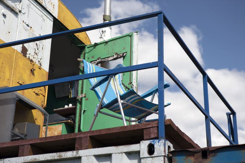 Deckchair on the rooftop stock image. Image of leisure 194671409
