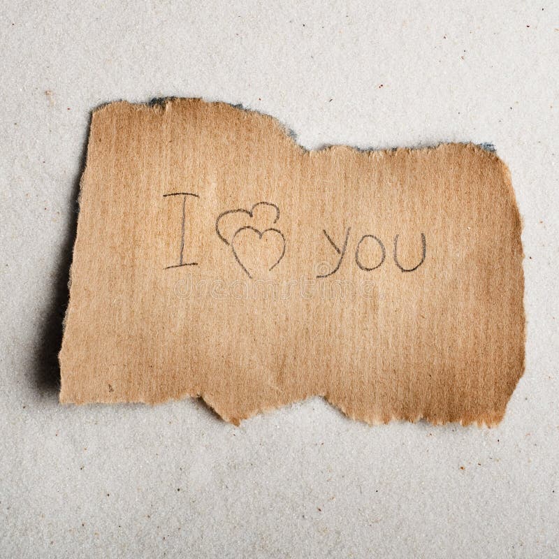 I love you. The message on fragmentary sheet. Sand fragment stock images, royalty-free photos and pictures