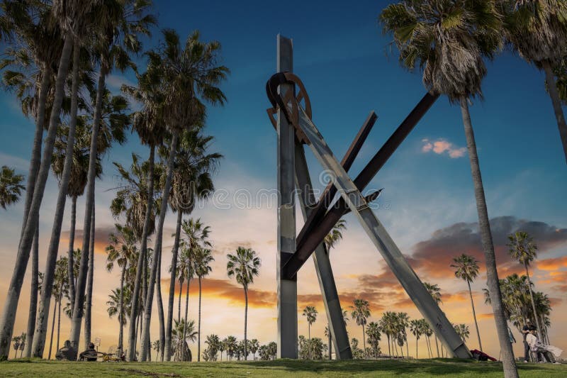 The Declaration Sculpture, a pair of massive, tilted triangles balanced to tower above the ground and stretch to meet its stock image