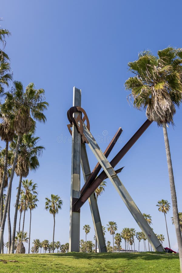 The Declaration Sculpture, a pair of massive, tilted triangles balanced to tower above the ground and stretch to meet its royalty free stock photo