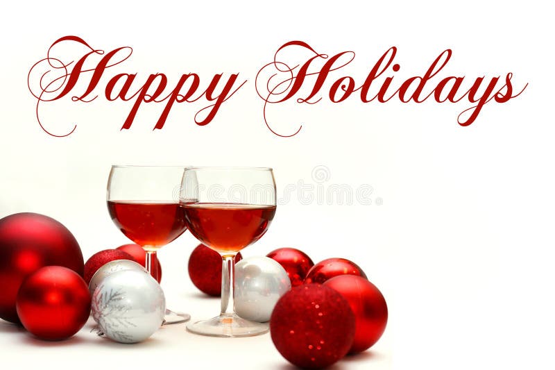 Decoraciones del vino rojo y de la Navidad con el texto buenas fiestas imagen de archivo libre de regalías Decoraciones del vino rojo y de la Navidad con el texto buenas fiestas imagen de archivo libre de regalías