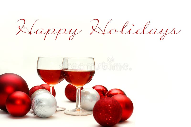 Decoraciones del vino rojo y de la Navidad con palabras buenas fiestas imagenes de archivo Decoraciones del vino rojo y de la Navidad con palabras buenas fiestas imagenes de archivo