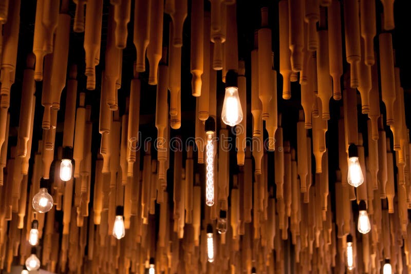 Decorated Ceiling a Lot of Rolling Pins and Light Bulb Stock Image